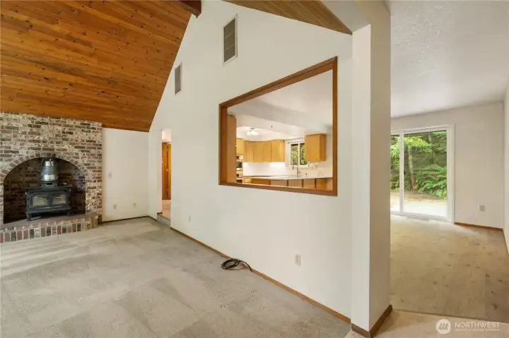 This large opening between main living spaces keeps everyone connected.
