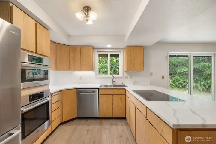 Quartz countertops and Bosch appliances makes you want to cook your favorite meals here everyday.