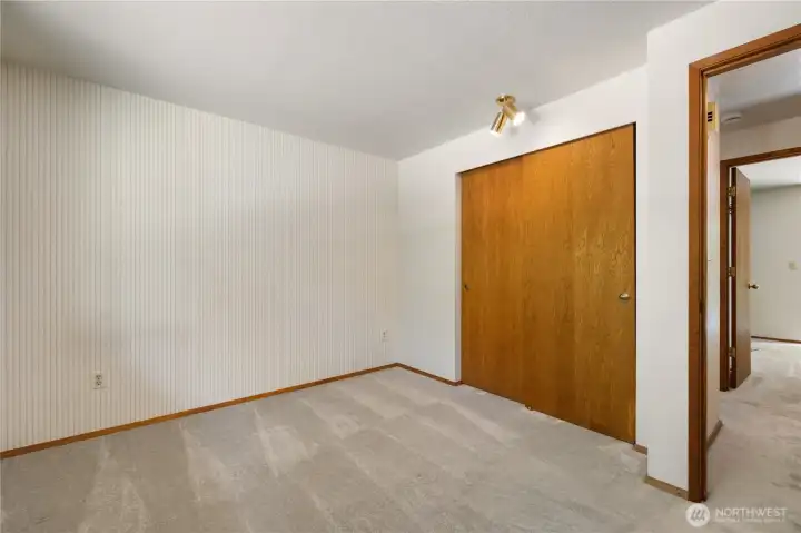Bedroom number 3 with view of the closet.