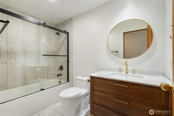 Updated main bathroom with modern touches.