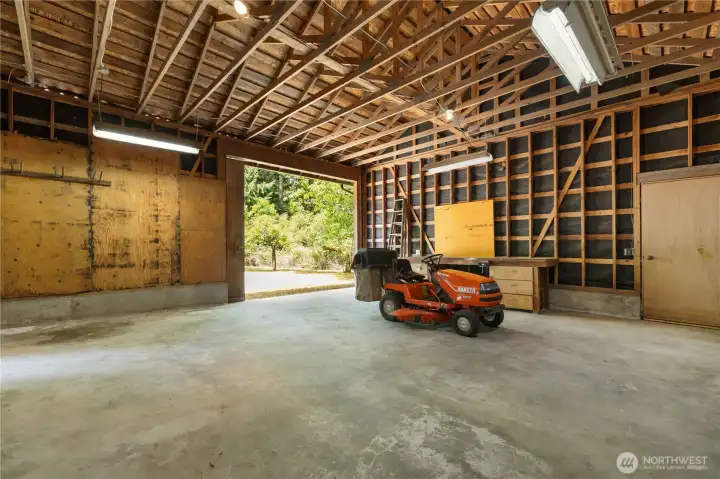 Barn door side of shop with more room to work and/or store an RV, boat, or other toys.