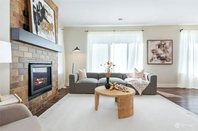 Family room with cozy gas fireplace.