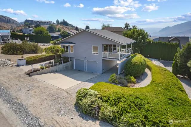 Parking galore!  Two car garage, tall covered carport (or "boatport"!), off street parking, and a parking space with  direct access to the front door.