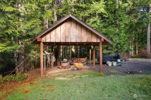 Custom structure for tractor and lawn equipment storage - or put walls up and you have a great play structure!