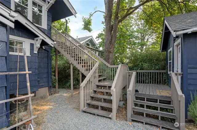 Entrance to Unit 3 on the left and private deck for Unit 4 on the right.
