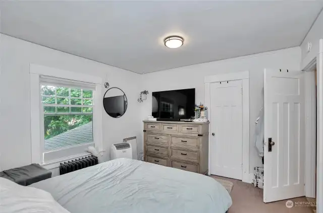 Unit 3 - Main bedroom with large, walk-in closet on the main floor of the unit.