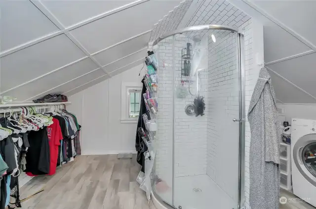Unit 3 - 3/4 bathroom with washer/dryer on the upper floor.