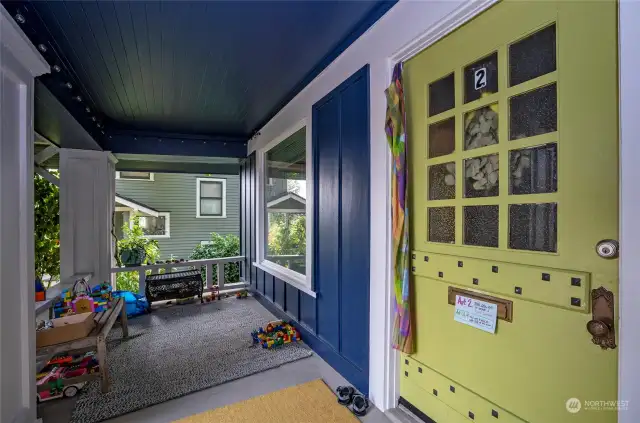 Large front porch and the entrance for Unit 2.