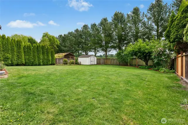 Fenced garden space and tool shed. Back gate access to Skagit River Park