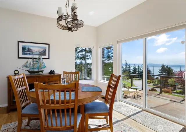 Formal dining area bathed in natural light.