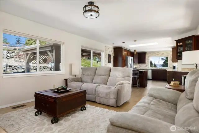 Sliding glass door connects the family room and kitchen to the back patio.