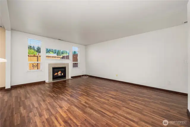 Light, bright living room with easy maintenance laminate flooring.