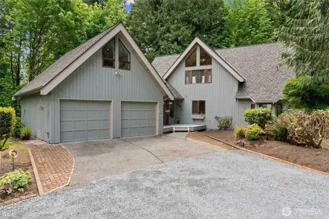 Welcome to Lord Hill! This stunning 2,560 Sqft home is nestled on a private 5-acre lot, featuring a 1,144 sq ft detached garage/shop and additional covered RV parking.