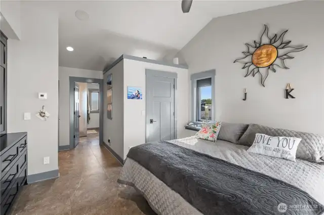 Primary bedroom with walk-in closet and bathroom.
