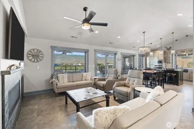 Living room open to dining room and kitchen. Great for entertaining.