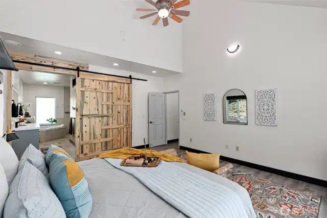 The custom barn door was also created by the homeowner which is another way nature is pulled into the interior of this home.
