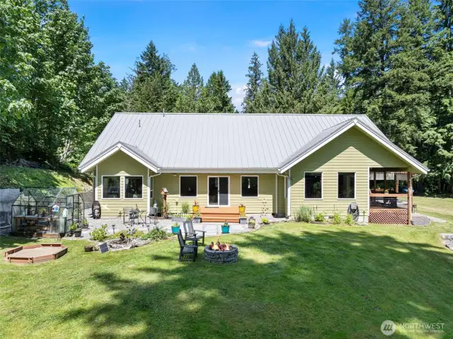 Spend the rainy days and nights listening to the metal roof. Roof comes with a 40 year material warranty. Home is also generator-ready with a dedicated transfer switch and exterior plug-in.