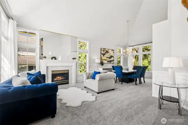 Cathedral ceilings and open-concept living space with a fireplace give this house a sense of grandeur bar none.