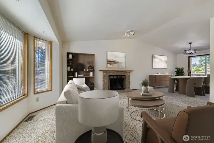 BRIGHT AND PLEASANT LIVING ROOM WITH ABUNDANT NATURAL LIGHT.