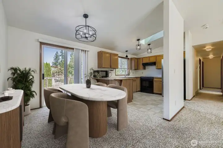 PERFECT DINING ROOM WITH EASY ACCESS TO KITCHEN AND LUXURY BACK DECK.
