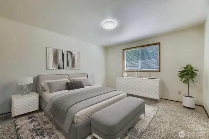 RESTFUL PRIMARY BEDROOM EASILY FITS A KING SIZE BED WITH ROOM FOR FURNITURE & PRIVATE ENSUITE BATHROOM.