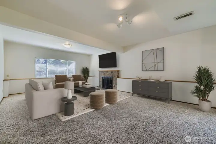 LARGE FAMILY ROOM WITH EASY ACCESS TO BACK DECK AND YARD.