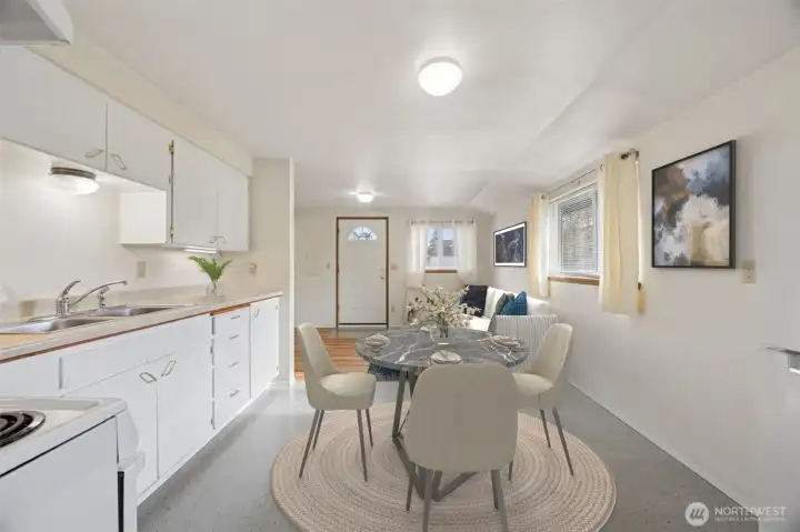 Kitchen and dining area and living space are the ideal set up. Lives cozy but spacious. All applicances are included!