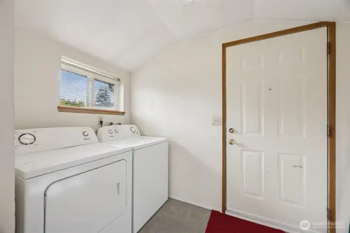 Easily accessible utility room off the kitchen with washer and dryer included.