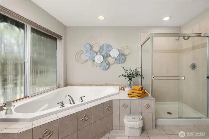 Primary bathroom with double sinks and soaking tub