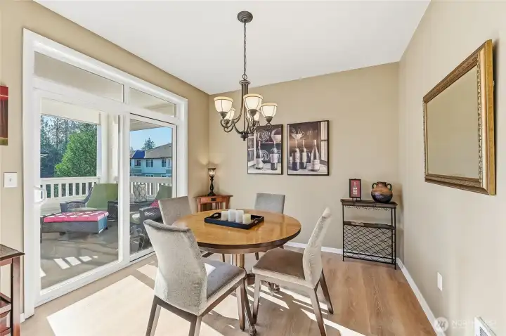 The nice sized dining area opens to the sprawling, south facing, covered deck.