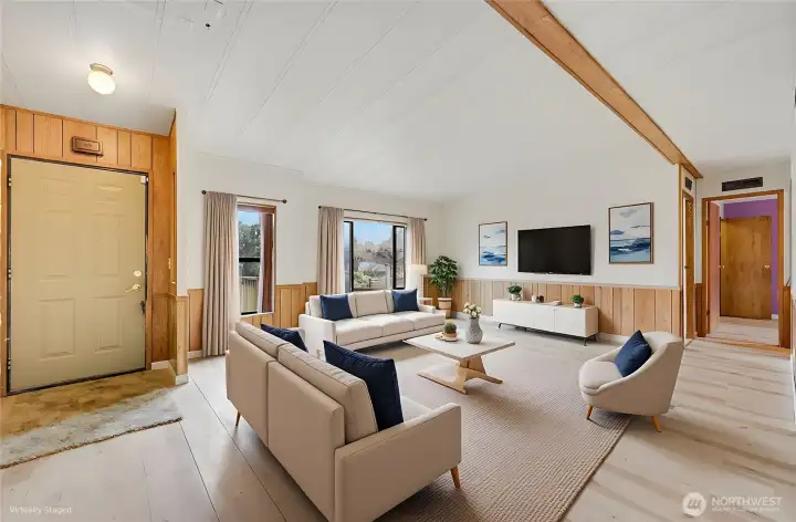 This is virtually staged, but as you can see the living room is very spacious, big windows let the natural pour in.