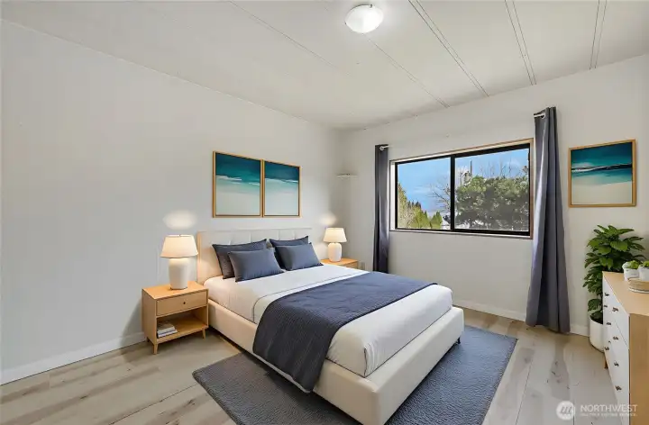 The virtually staged bedroom #2, freshly painted and ready to move in.