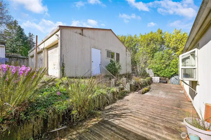 Access to the large 2 car shop with plenty of shop space located just off the back deck.