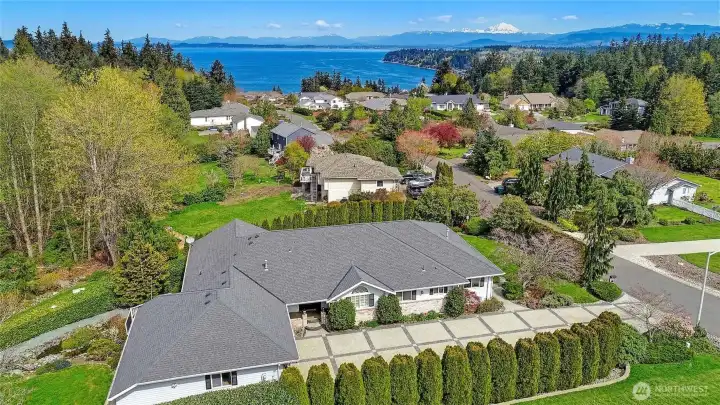 Nestled in a scenic neighborhood with panoramic water and Mt. Baker views.