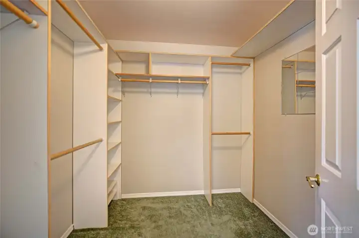 Thoughtfully designed closet space with ample shelving and hanging areas.