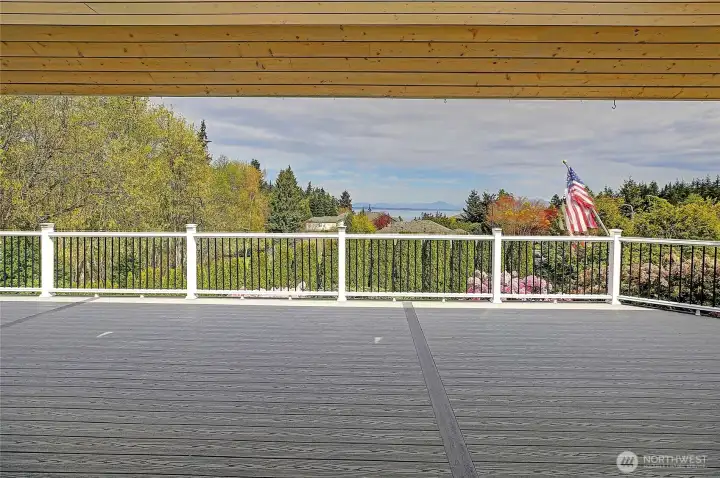 Large deck with both covered and open areas, complete with electric heaters for all-season comfort.