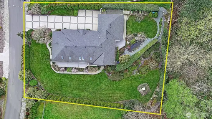 Expansive lot with added privacy thanks to the bordering greenbelt.