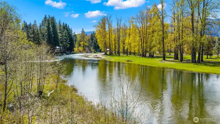 Beautiful river front lot, low bank, basically no bank, this 1/2 acre has stunning views.