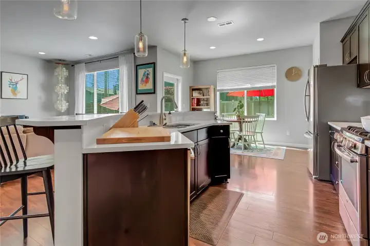 Your kitchen opens to the living area where everyone always gathers.  Theres a great eat in kitchen as well as a breakfast bar.