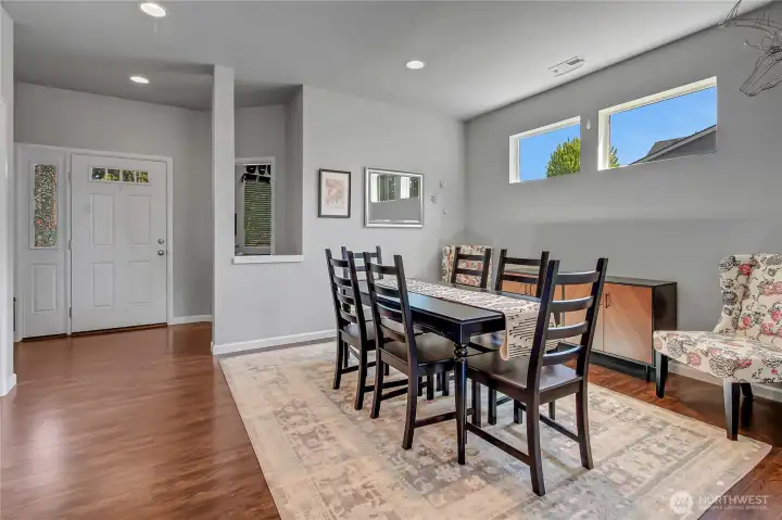 Your dining room can be used as the formal dining area or turn it into a hobby or play area.   Notice the higher windows that let lots of natural light flood the room and yet protect the privacy you like.