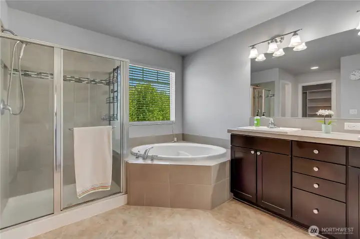 A large beautiful shower and a great place to soak your cares away.