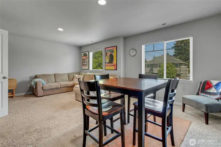 Upstairs is a huge bonus room currently used to enterain friends.  It's a great place for games, hobbies, or a movie room.