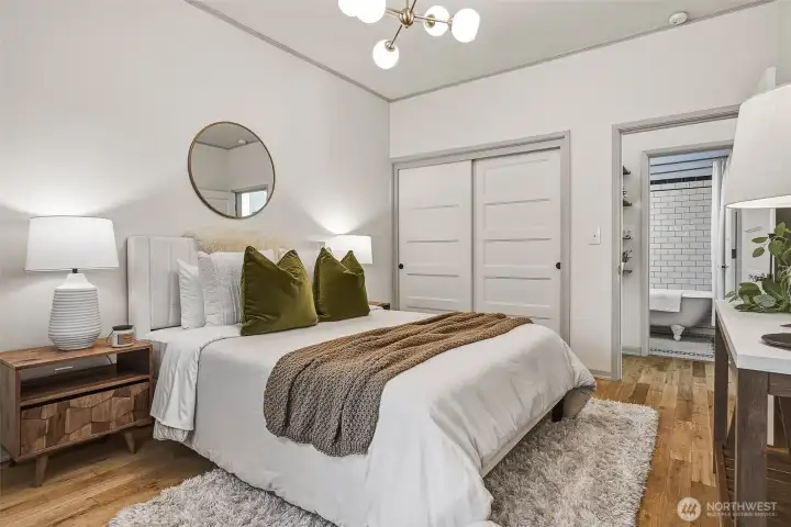Beautiful, genuine hardwood flooring flows throughout.