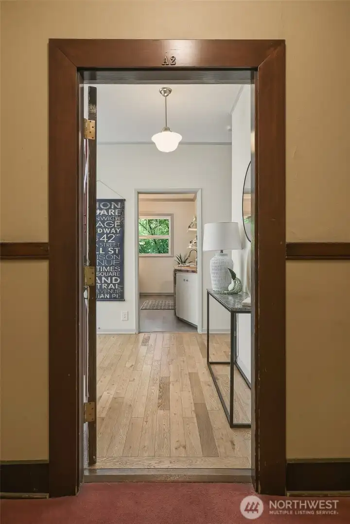 Rich hardwood accents & flooring lend a warm, vintage vibe.