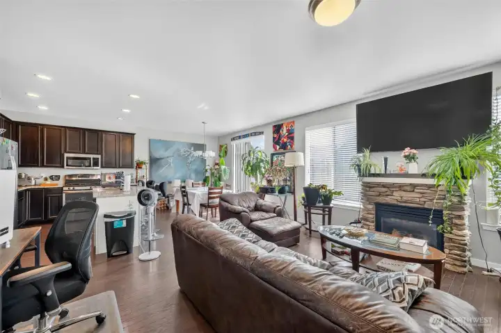 Open-concept great room with fireplace Open-concept great room with fireplace