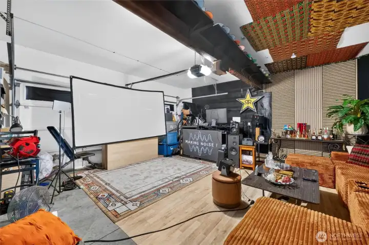 Two car garage currently used as a podcast studio. Two car garage currently used as a podcast studio.