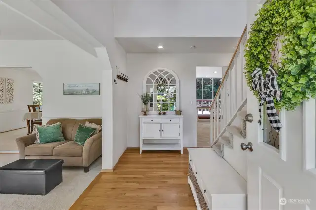 Feels like home as you step into the front door. Hardwood entry with a step down into the formal living room. Floorplan for both floors allow so much light inside.