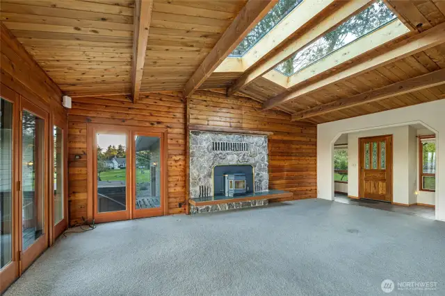 Another view of the living room, looking towards the entry and hallway.