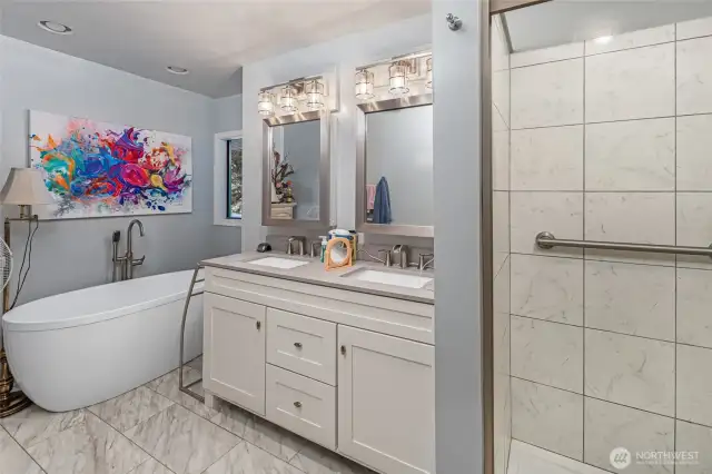 The en suite bathroom with soaking tub and walk-in shower.