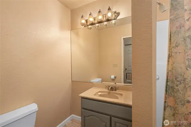 The second bathroom with walk-in shower